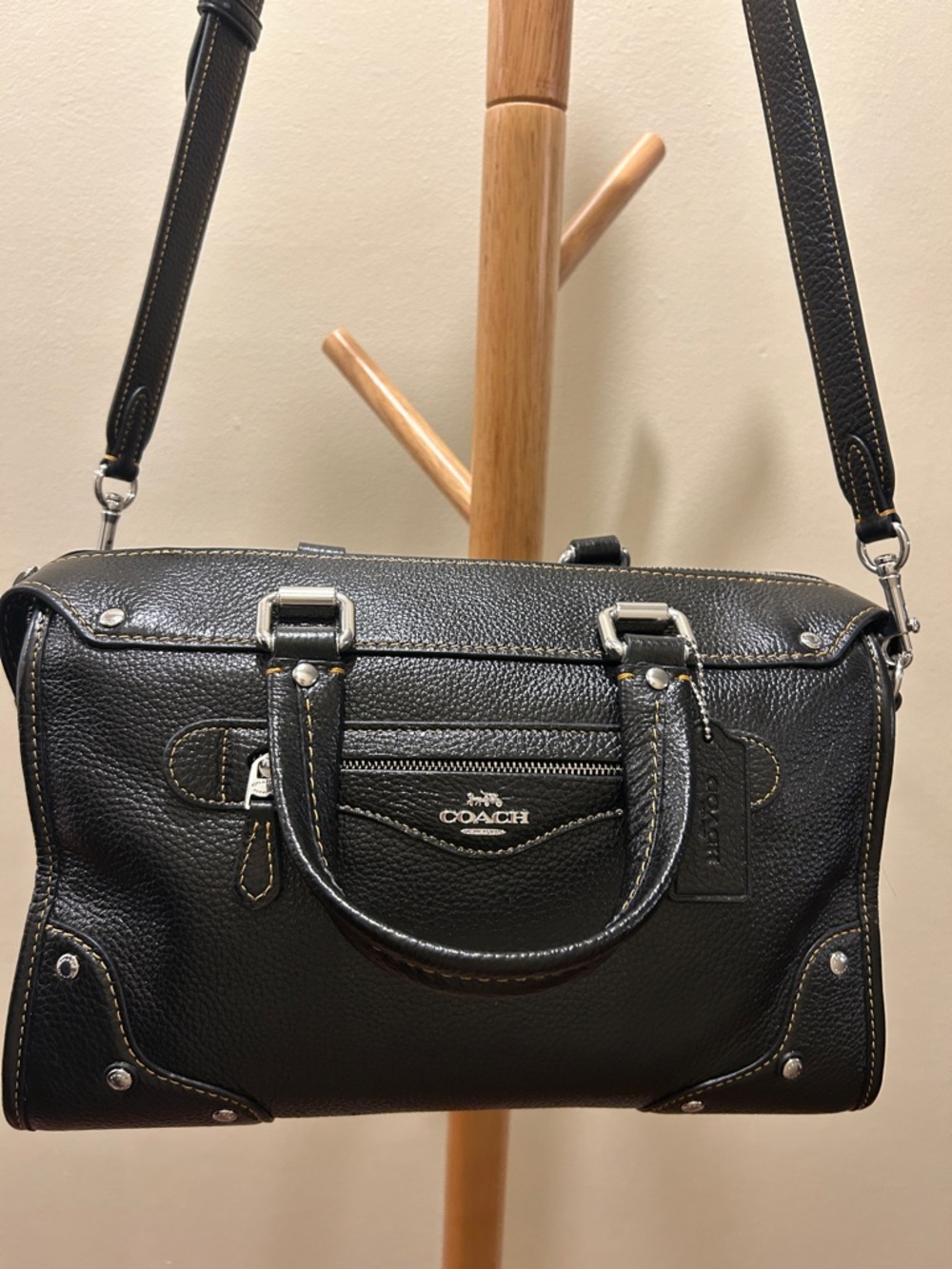 Coach Black Pebbled Leather satchel bag with top handles and crossbody strap